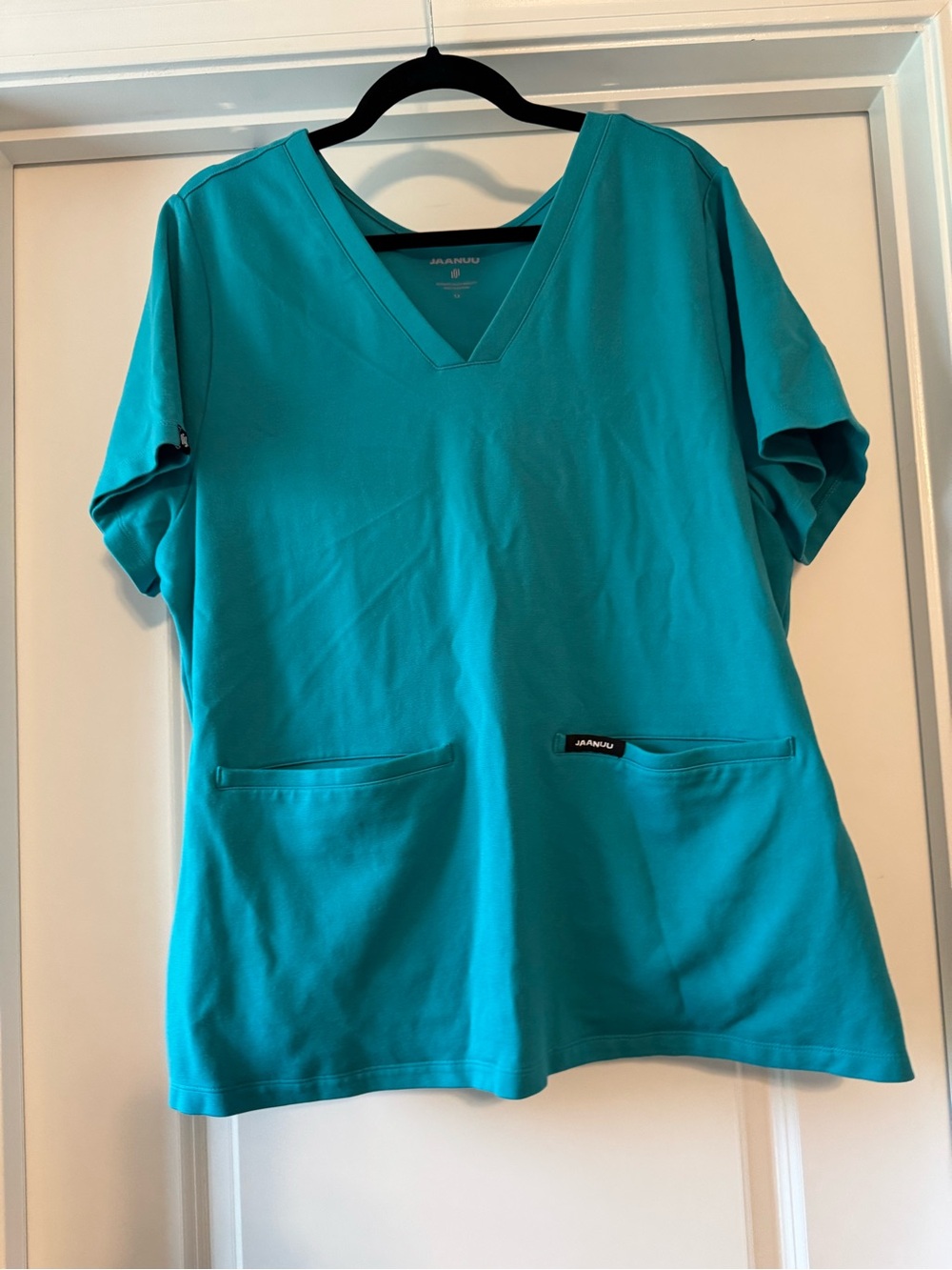 Jaanuu Women's V-Neck Scrub Top in Teal Blue